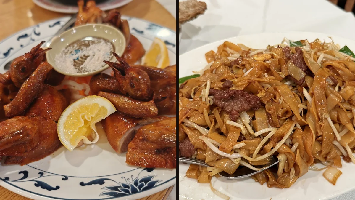 Plates of Cantonese seafood on a restaurant table.